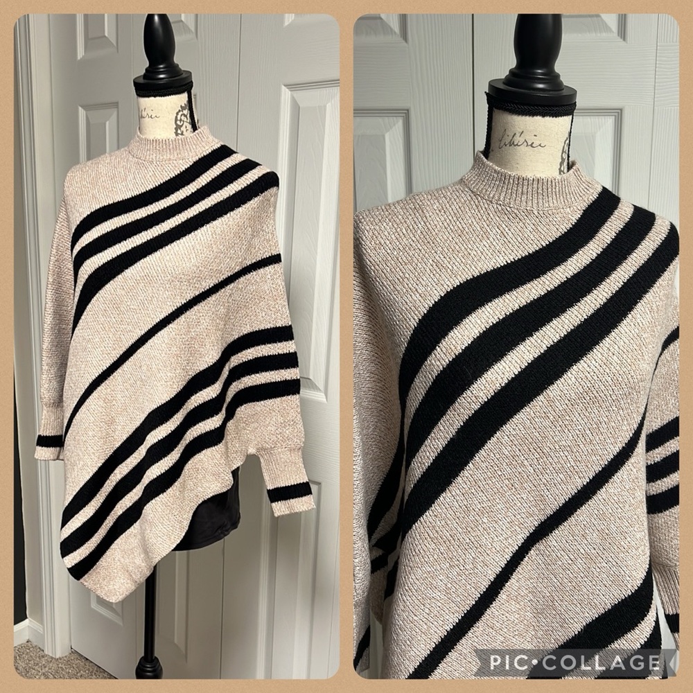 Beautiful asymmetric sweater. Gorgeous neutral colors.
